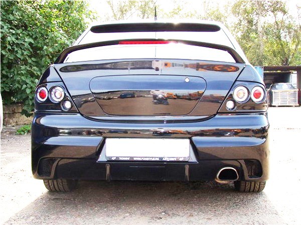 Декоративная заглушка крышки багажника в стиле EVO для Mitsubishi Lancer IX (2003-2009) купить недорого с доставкой в Волоколамск