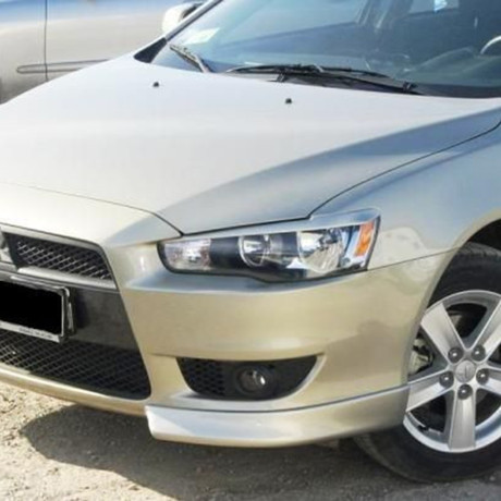 Клыки переднего бампера "Реплика" для Mitsubishi Lancer X купить недорого с доставкой в Волоколамск
